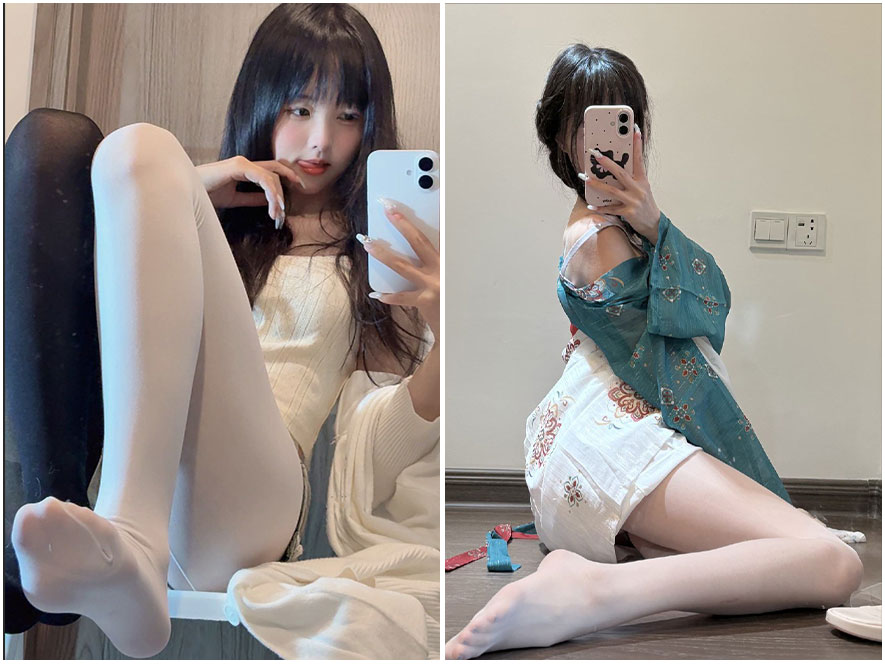 小甜酒子身着白色丝绸吊带裙侧卧在沙发上